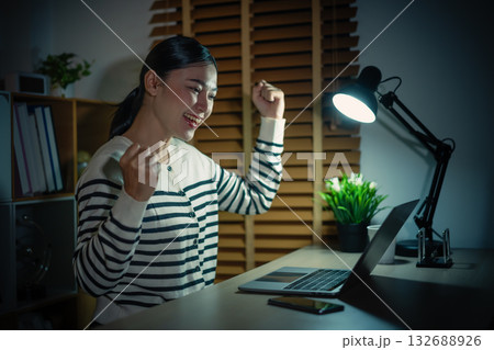 success woman working with laptop at night success woman working with laptop at night 132688926