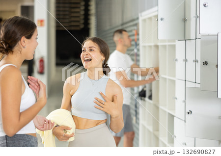 Young women exchanged couple of phrases in ladies locker room after changing clothes 132690827