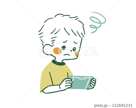 困った表情でゲームをしている子供-4色 132691231