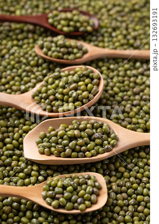 Mung bean in difference wooden spoon with mung bean seed background, Asian food ingredient Mung bean in difference wooden spoon with mung bean seed background, Asian food ingredient 132693191