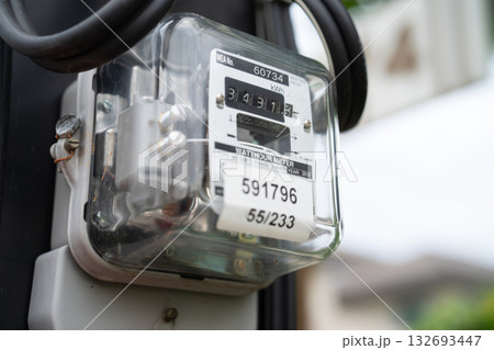 Electric measuring power meter for energy cost at home and office. 132693447