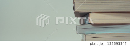 stack of book on table with soft focus library or bookstore background stack of book on table with soft focus library or bookstore background 132693545