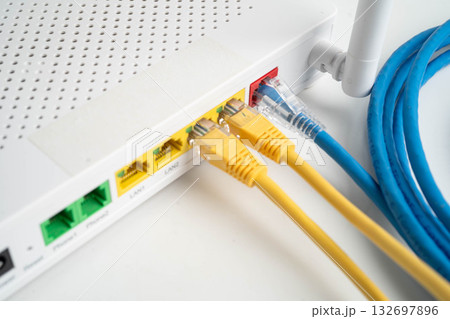 Ethernet cable with wireless router connect to internet service provider network. Ethernet cable with wireless router connect to internet service provider network. 132697896