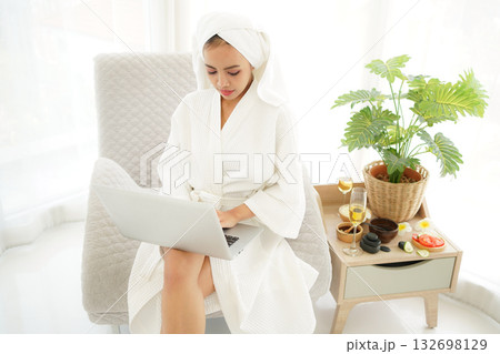 Young women relaxing enjoy and spa massage put on bathrobe in modern room. Young women relaxing enjoy and spa massage put on bathrobe in modern room. 132698129
