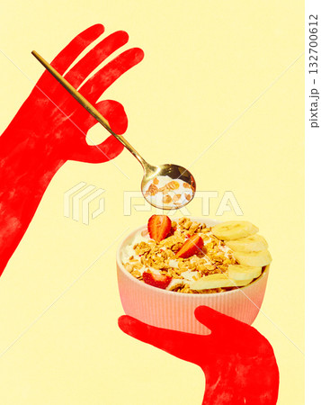 Trendy composition. Red hands holding yogurt bowl with granola banana and strawberries Trendy composition. Red hands holding yogurt bowl with granola banana and strawberries 132700612