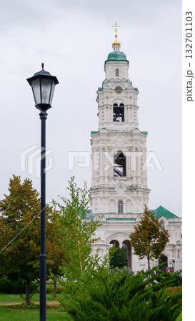 View of the Astrakhan Kremlin with the Assumption Cathedral and the bell tower on a cloudy day. Astrakhan, Russia 132701103