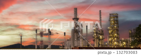 Banner Oil refinery gas petrol plant industry with crude tank, gasoline supply chemical factory. Petroleum barrel fuel heavy industry oil refinery manufacturing factory plant on twilight night time Banner Oil refinery gas petrol plant industry with crude tank, gasoline supply chemical factory. Petroleum barrel fuel heavy industry oil refinery manufacturing factory plant on twilight night time 132703083