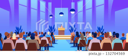 Conference audience listening keynote speaker modern auditorium large windows indoor plants blue purple background event presentation stage Conference audience listening keynote speaker modern auditorium large windows indoor plants blue purple background event presentation stage 132704569
