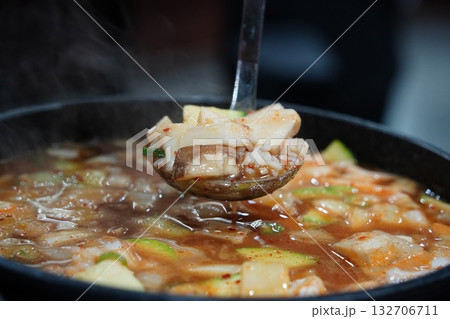 Hearty Korean Soybean Paste Stew with Rice, Tofu, and Vegetables 132706711