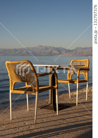 Empty restaurant terrace with seaview, Greece 132707376