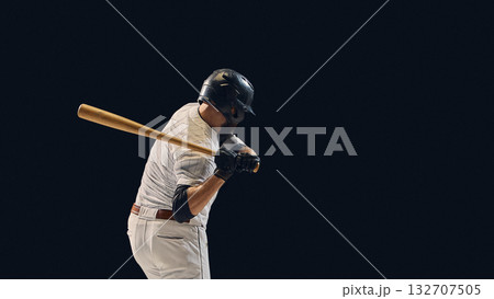 Baseball batter lowering bat before swing showing pre-impact shoulder control Baseball batter lowering bat before swing showing pre-impact shoulder control 132707505