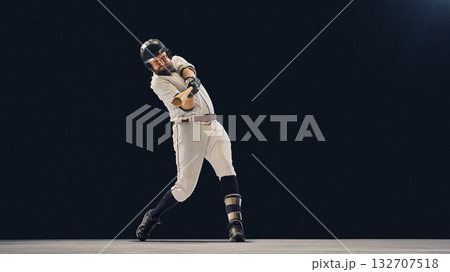 Baseball player follow-through form used for hitting mechanics instruction 132707518