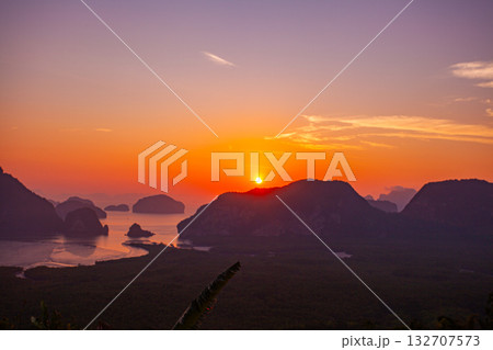 aerial view Imagine a beautiful bright red sky in sunrise over Samed Nang Chee Phang Nga aerial view Imagine a beautiful bright red sky in sunrise over Samed Nang Chee Phang Nga 132707573