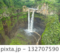 Aerial view The twin waterfalls flowing down large cliffs are unusually beautiful. 132707590