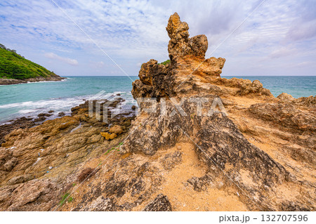 Tourists like to climb up and take photos On top of this small island 132707596