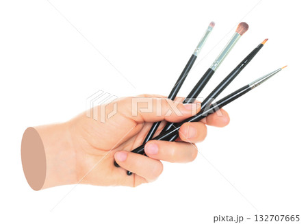 Woman hand holds black cosmetics brush, isolated on transparent background, cosmetics and visage concept. Contemporary art Woman hand holds black cosmetics brush, isolated on transparent background, cosmetics and visage concept. Contemporary art 132707665