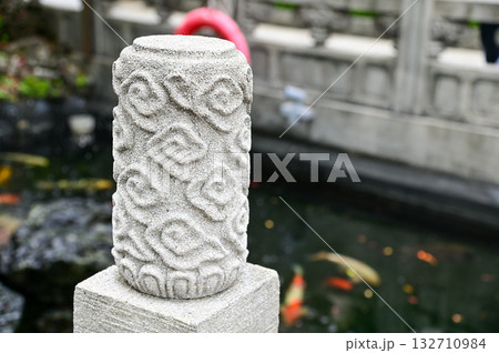 The scene of the garden of the Mengjia Longshan Temple in Taipei, Taiwan. Chinese folk religion landmark. Buddhist Temple. Religious and traditional Chinese art. 132710984