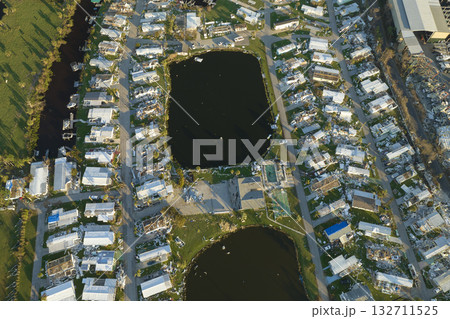Badly damaged mobile homes after hurricane Ian in Florida Southwest region residential area. Consequences of natural disaster 132711525
