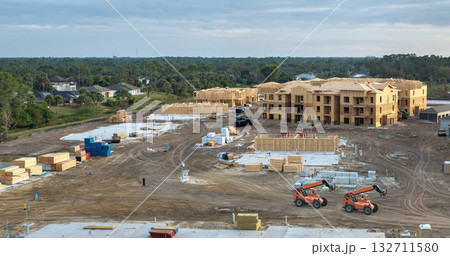 Apartment condos under construction. Development of residential housing in North Port, Florida. Real estate market in the USA Apartment condos under construction. Development of residential housing in North Port, Florida. Real estate market in the USA 132711580