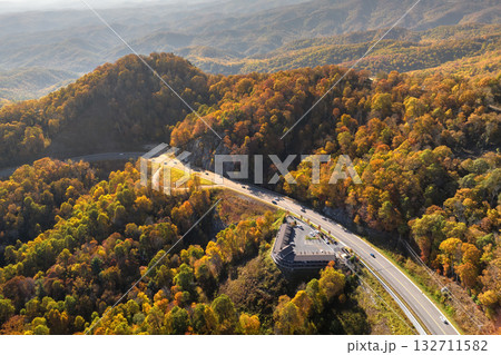 American highway in North Carolina Appalachian mountains in fall season with fast moving traffic. Interstate transportation concept 132711582