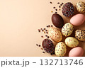 Row of chocolate eggs with sprinkles on top 132713746