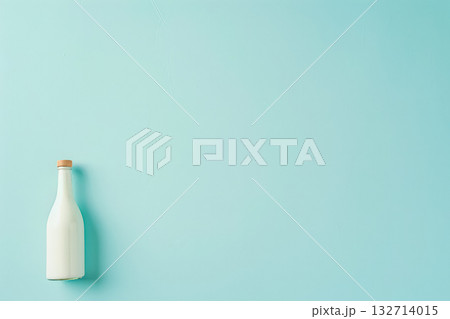 Bottle of milk is on a blue background Bottle of milk is on a blue background 132714015