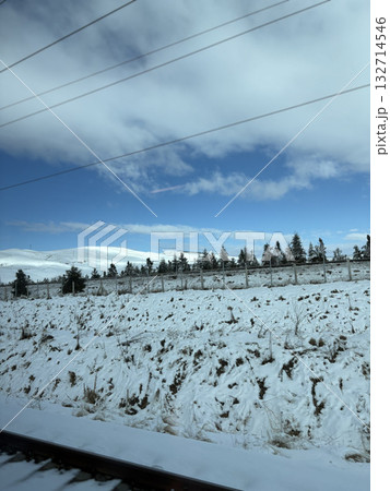 view from the train on a snowy road. High quality photo view from the train on a snowy road. High quality photo 132714546