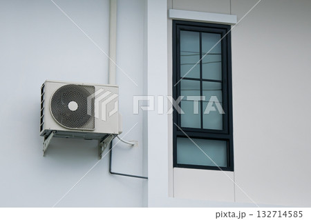 Hot coil of air conditioner installed outside the building Hot coil of air conditioner installed outside the building 132714585