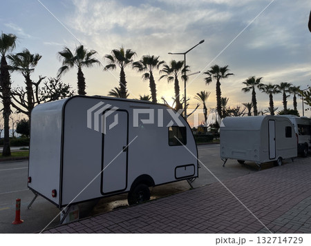 mobile home trailer on the coast vacation by the sea palm trees. High quality photo 132714729