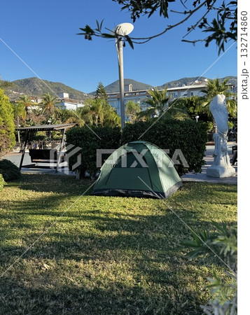 tent in the park summer rest green. High quality photo tent in the park summer rest green. High quality photo 132714860