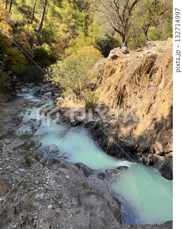 stream in the mountains against the backdrop of nature spring in the mountains against the backdrop of nature. High quality photo 132714997