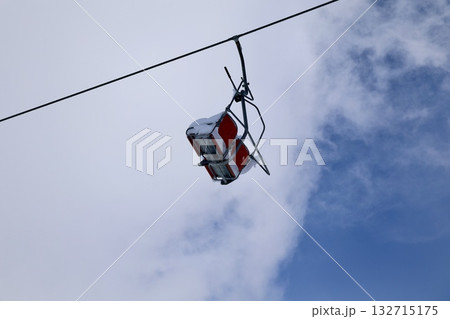 Snowy mountain ski-lift no people, blue sky, azure, air, freshness, ecology. High quality photo Snowy mountain ski-lift no people, blue sky, azure, air, freshness, ecology. High quality photo 132715175