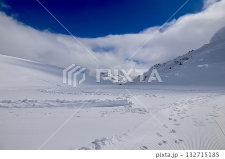 Snowy mountain ski-lift no people, blue sky, azure, air, freshness, ecology. High quality photo 132715185