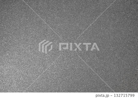 Abstract metallic silver glitter surface with fine grain details and bright shimmering reflections Abstract metallic silver glitter surface with fine grain details and bright shimmering reflections 132715799