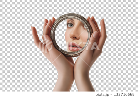 Close-up of a handheld mirror reflecting a beautiful female face, ideal for beauty blogs, cosmetic ads, or mental health themes on self-perception Close-up of a handheld mirror reflecting a beautiful female face, ideal for beauty blogs, cosmetic ads, or mental health themes on self-perception 132716669