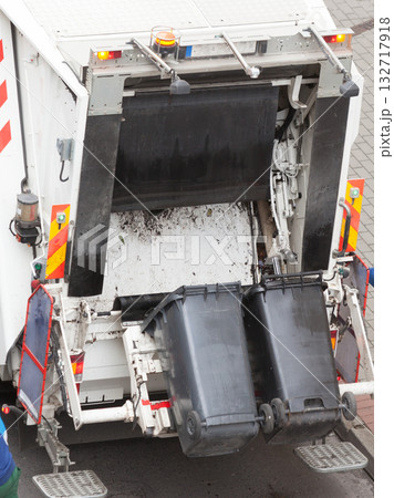 Garbage dustcart truck on city street 132717918