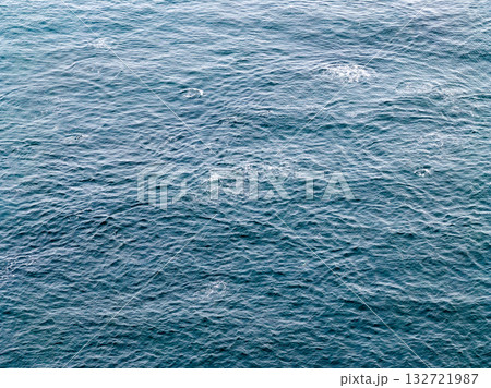 Aerial view of common dolphins feeding above huge dragnet in Donegal Bay, Ireland Aerial view of common dolphins feeding above huge dragnet in Donegal Bay, Ireland 132721987