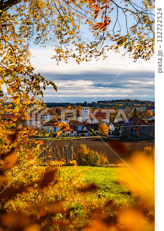 Church In Gilching, Bavaria: Picturesque Autumn Village Landscape With Colorful Trees, Golden Fields, And Dramatic Sky Near Munich 132722524