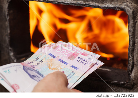 Heating the house costs a lot of money in Ukraine due to war and general crisis in the country. Warmth in the house in cold and expensive winter period Heating the house costs a lot of money in Ukraine due to war and general crisis in the country. Warmth in the house in cold and expensive winter period 132722922
