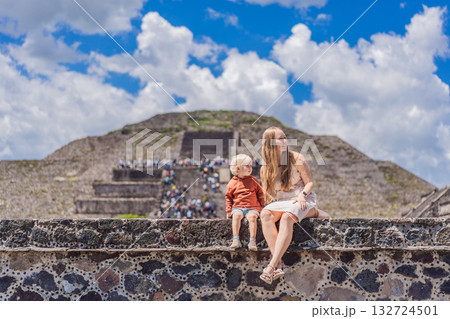 Mother and her son as tourists in front of Teotihuacan pyramids, Mexico, enjoying sightseeing, family travel, and cultural exploration together Mother and her son as tourists in front of Teotihuacan pyramids, Mexico, enjoying sightseeing, family travel, and cultural exploration together 132724501