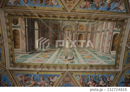 Perspective view of renaissance ceiling and illusionistic painted architecture trompe l oeil columns arches and tiled floor museum room interior Rome Italy heritage. High quality photo 132724828