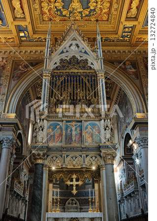 Archbasilica of Saint John Lateran interior Rome golden coffered ceiling marble columns statues ornate chapels baptistery and apse Catholic basilica Italy. High quality photo 132724840