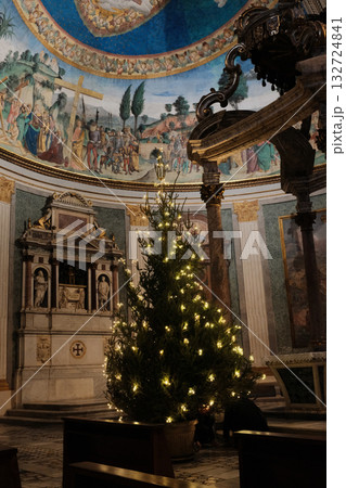 Basilica of the Holy Cross in Jerusalem Rome apse with mosaic baldachin and nativity scene Christmas decorations ornate Catholic church interior editorial use only. High quality photo 132724841