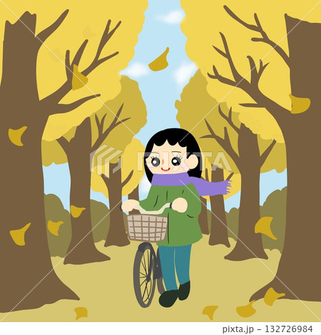 自転車を押しながら落ち葉が舞う並木道（イチョウ並木）を歩く人 132726984
