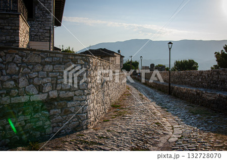 Sunset over the town of Berat on the Osum River, known for its white Ottoman houses. Also called the 'City of a Thousand Windows,' it is built against the hillside below the citadel. Sunset over the town of Berat on the Osum River, known for its white Ottoman houses. Also called the 'City of a Thousand Windows,' it is built against the hillside below the citadel. 132728070