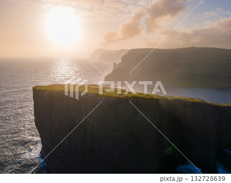 Scenic viewpoint on Traelanipa trail, overlooking dramatic basalt cliffs and vast volcanic rock formations above the ocean. 132728639