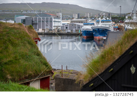 Torshawn city, the capital of The Faroe Islands, Denmark. Vestaravag harbor in Torshavn with its boats and colorful buildings. High quality photo Torshawn city, the capital of The Faroe Islands, Denmark. Vestaravag harbor in Torshavn with its boats and colorful buildings. High quality photo 132728745