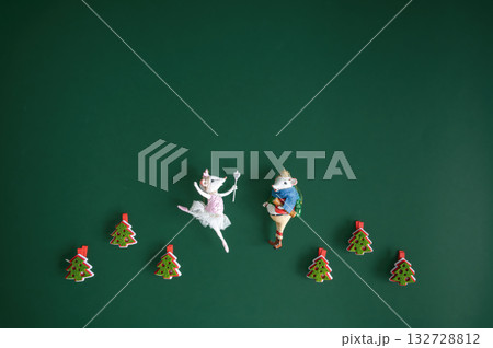 Festive dark green Christmas background decorated with ornaments, baubles, and holiday lights, creating a cozy seasonal atmosphere. 132728812
