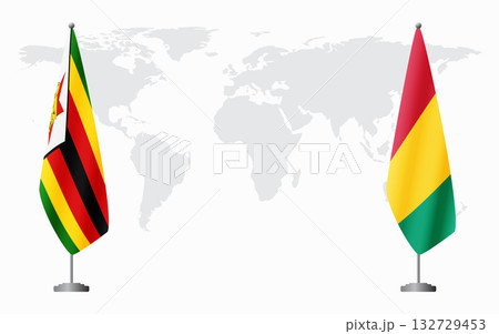 Zimbabwe and Guinea flags for official meeting 132729453