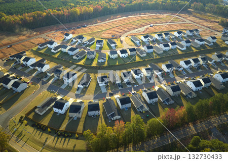 Aerial view of tightly located new family houses in South Carolina suburban area. Real estate development in american suburbs 132730433